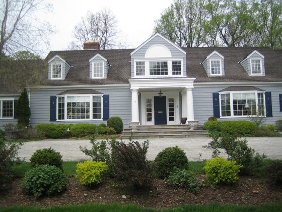 residential property with asphalt shingle roof