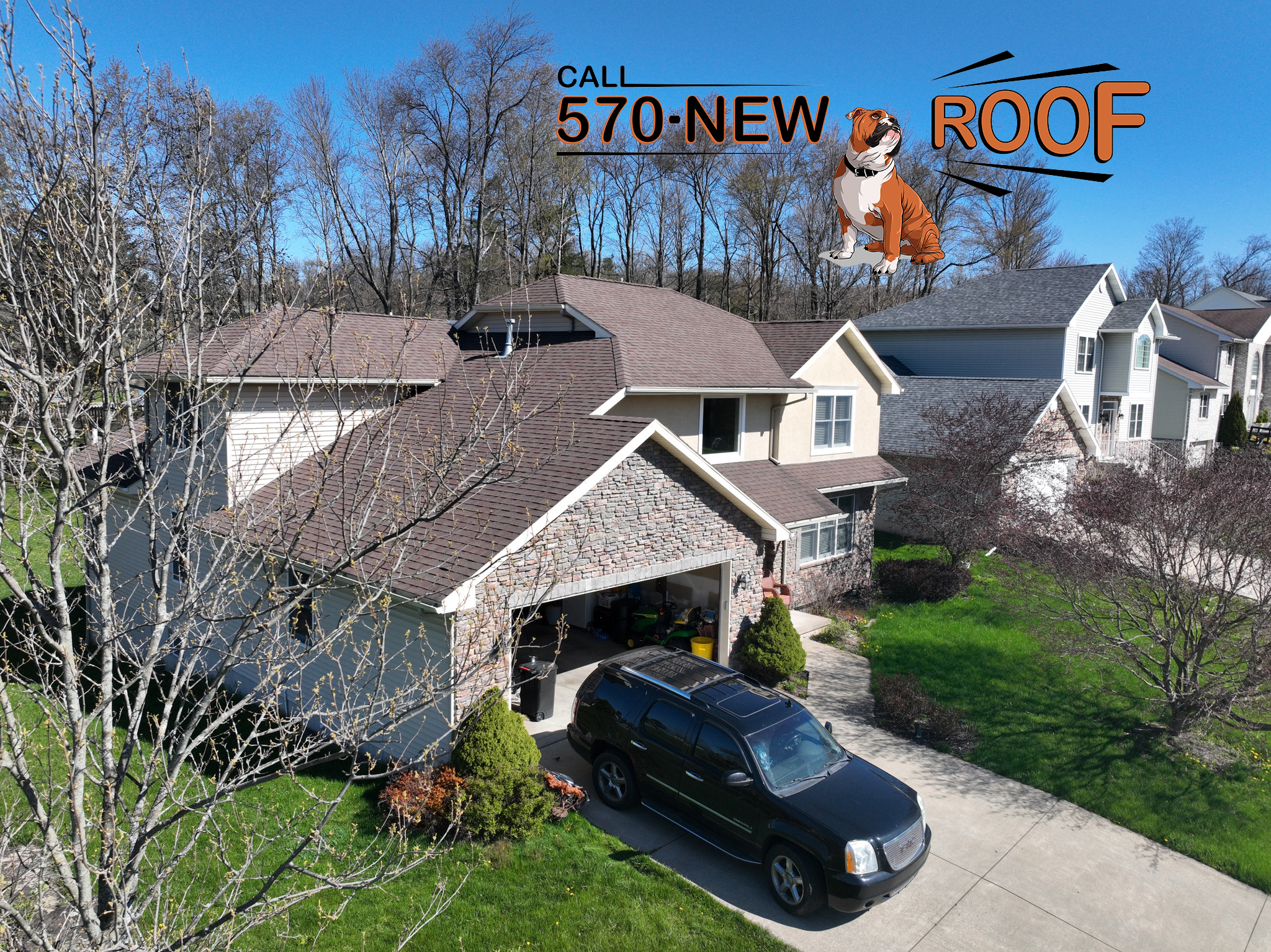 Suburban home with asphalt shingle roofing system